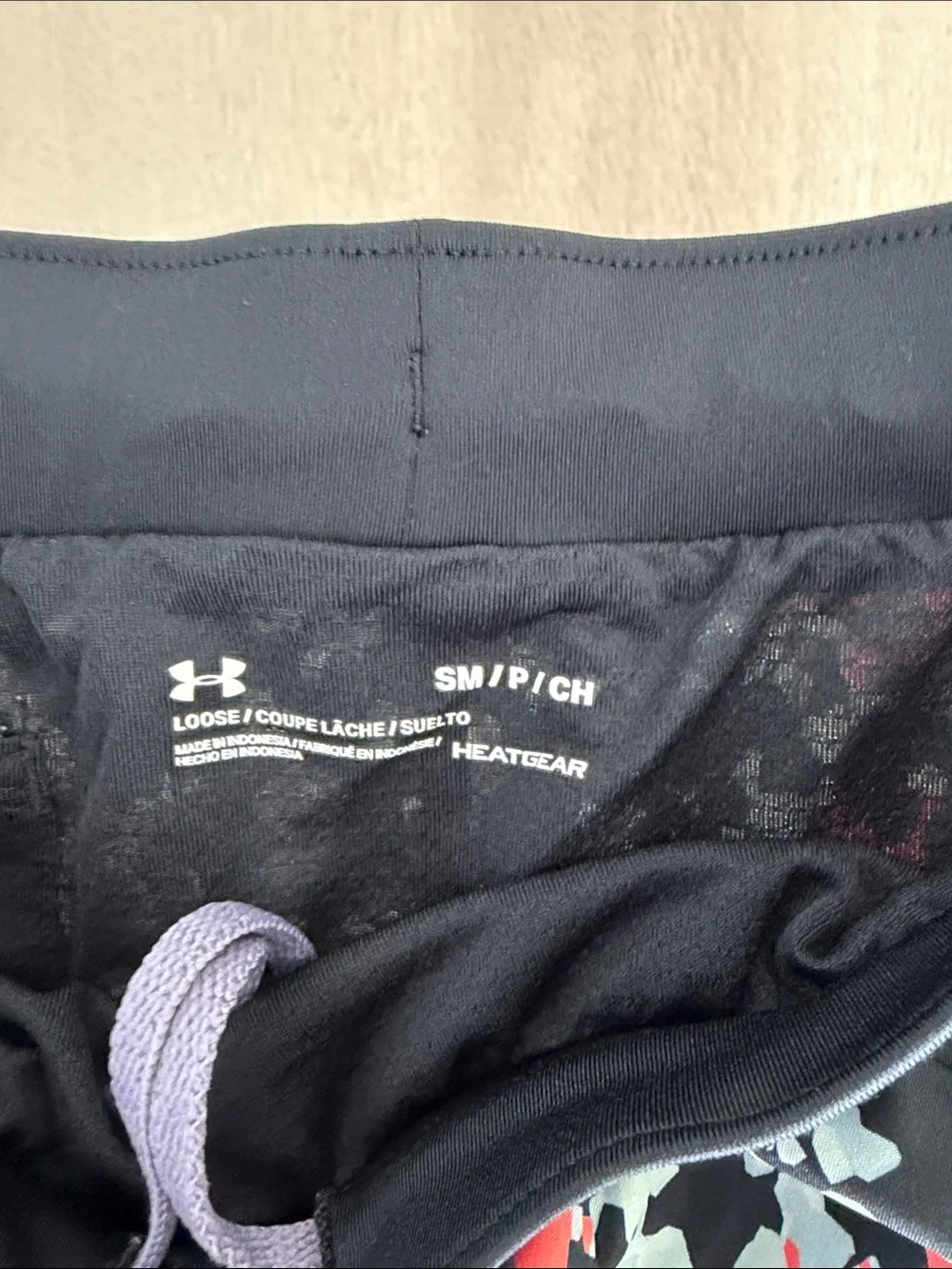Under Armour Black Shorts with Purple Drawcord and Multicolor Floral Print